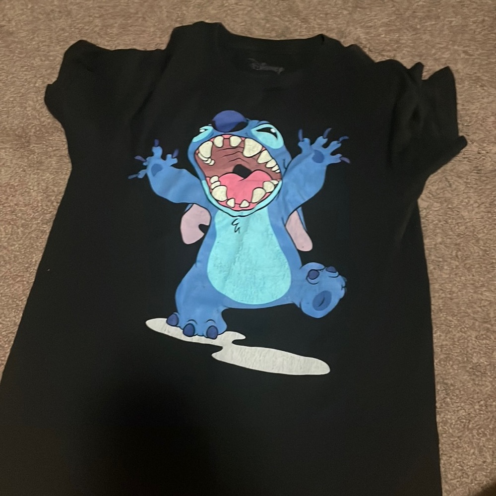 Black tee with stitch on it